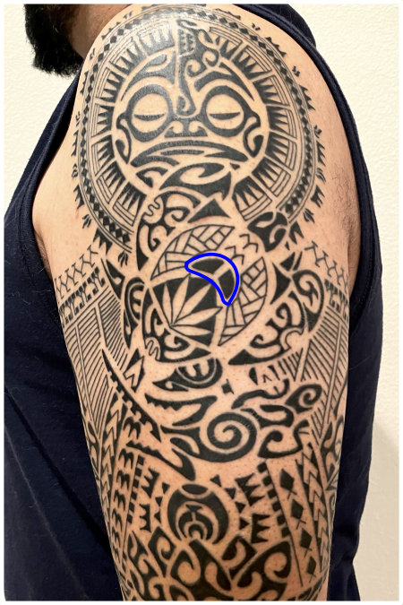 Polynesian half sleeve tattoo